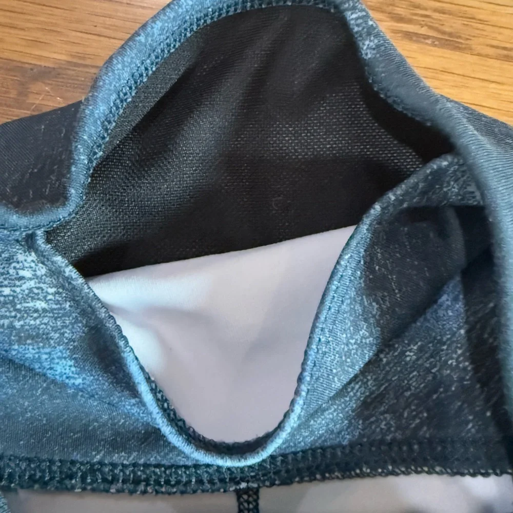Nike Therma-FIT One. Women's High-Waisted 7/8 Leggings. Blues. Size Small.
